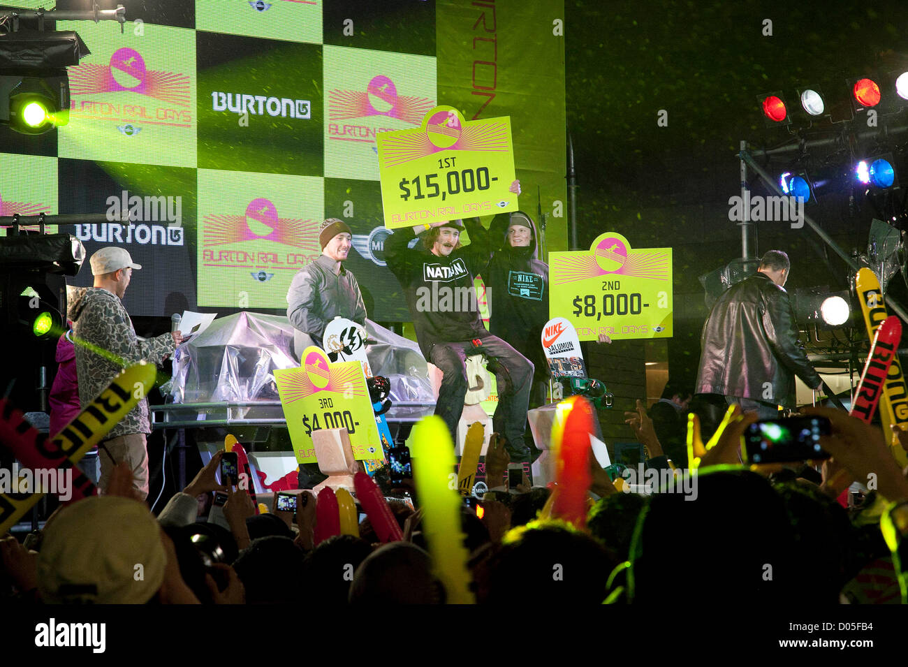 November 17, 2012, Tokyo, Japan - (L to R) Johan Owen, Forest Bailey and Jaime Nicholls, the top 3 of the snowboarding competition celebrate their victory during the 'BURTON RAIL DAYS presented by MINI' competition, the biggest street snowboarding contest in downtown Tokyo. The world's top pro snowboarders came together to perform various tricks on handrails and ledges during this event at the Roppongi Hills Arena. (Photo by Rodrigo Reyes Marin/AFLO) Stock Photo