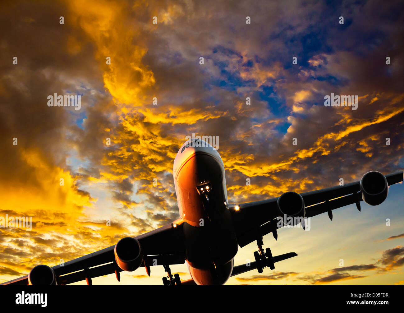 Jet PLane on approach to airport under stunning cloud formations.  Composite image Stock Photo