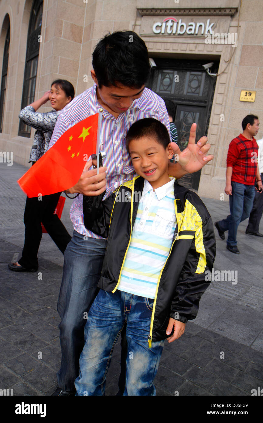 Shanghai China,Asia,Chinese,Oriental,Huangpu District,The Bund,Zhongshan Road,boy boys,male kid kids child children youngster youngsters youth youths Stock Photo