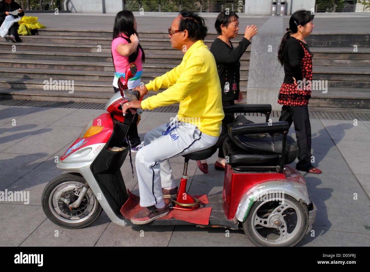 Asian tour group scooters hi-res stock photography and images - Alamy