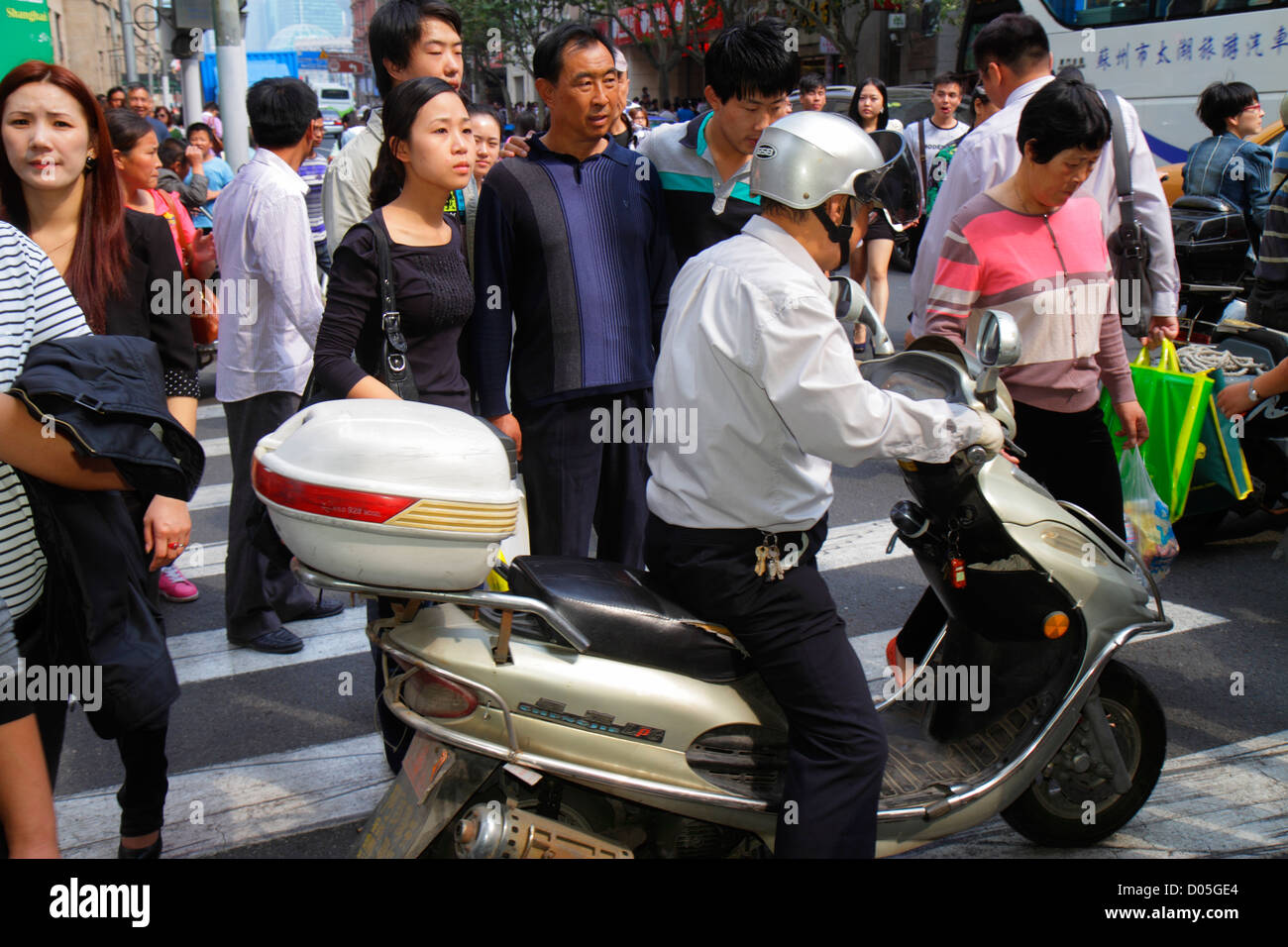 Asian tour group scooters hi-res stock photography and images - Alamy
