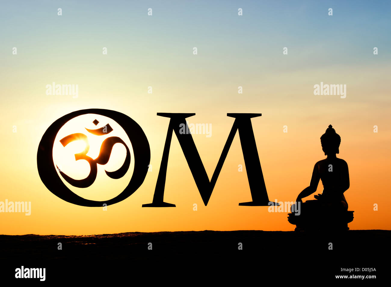 Hindu OM / AUM symbol and silhouette Buddha at sunset. India Stock Photo