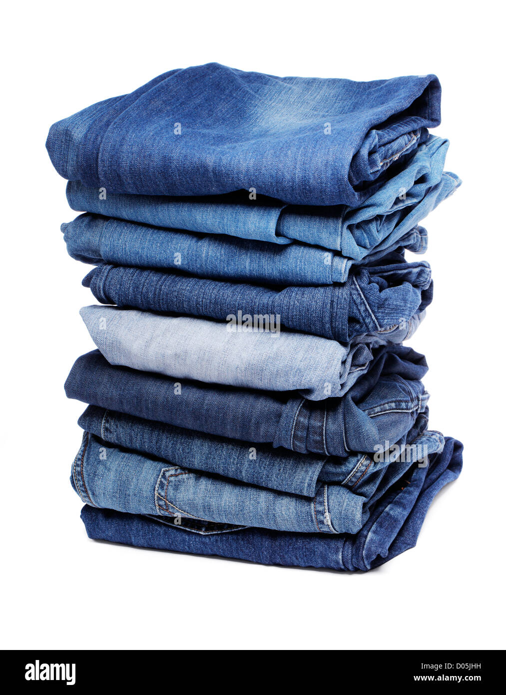 A Stack of different shades of blue denim jeans isolated on white with  natural shadow Stock Photo - Alamy