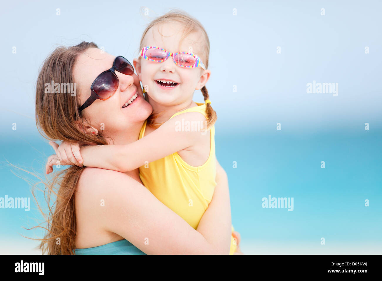 Family on summer beach vacation Stock Photo - Alamy