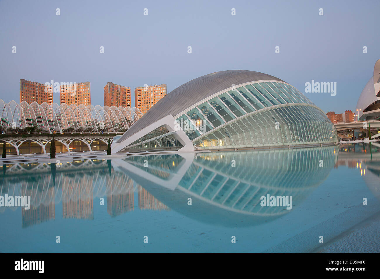 City of Arts & Sciences, Valencia, featuring the Hemisferic cinema reflected in the quiet evening light. Stock Photo