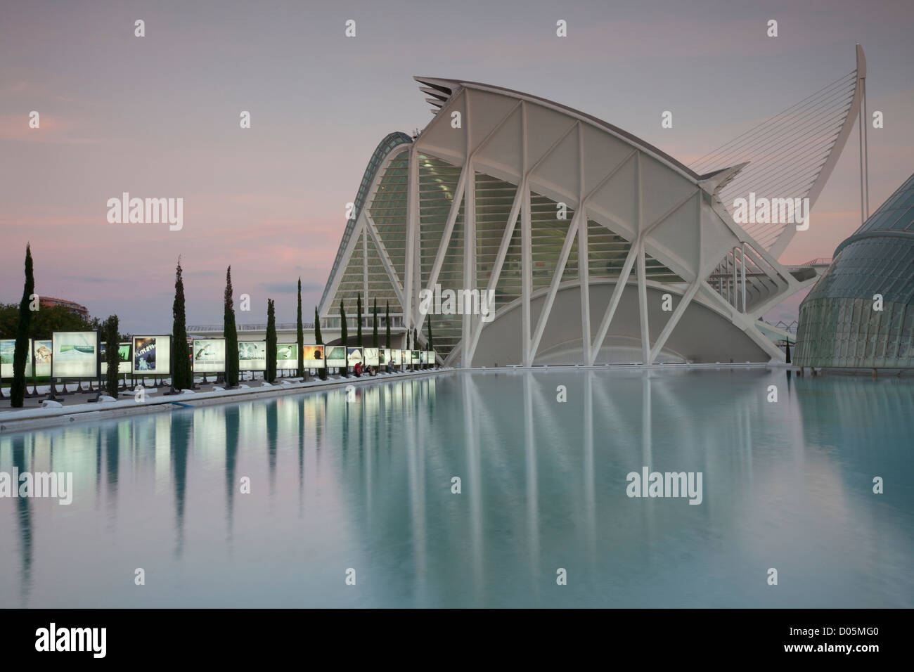 Museu de les Ciencies, City of Arts & Sciences, Valencia, reflected in calm water at sunset. Stock Photo