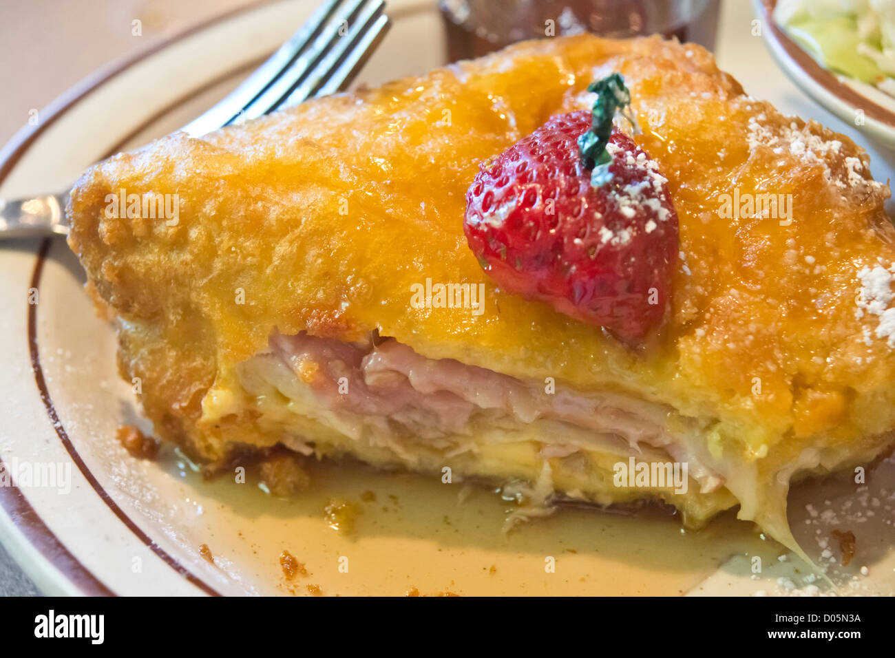 A deepfried, battered Monte Cristo sandwich served in California ham