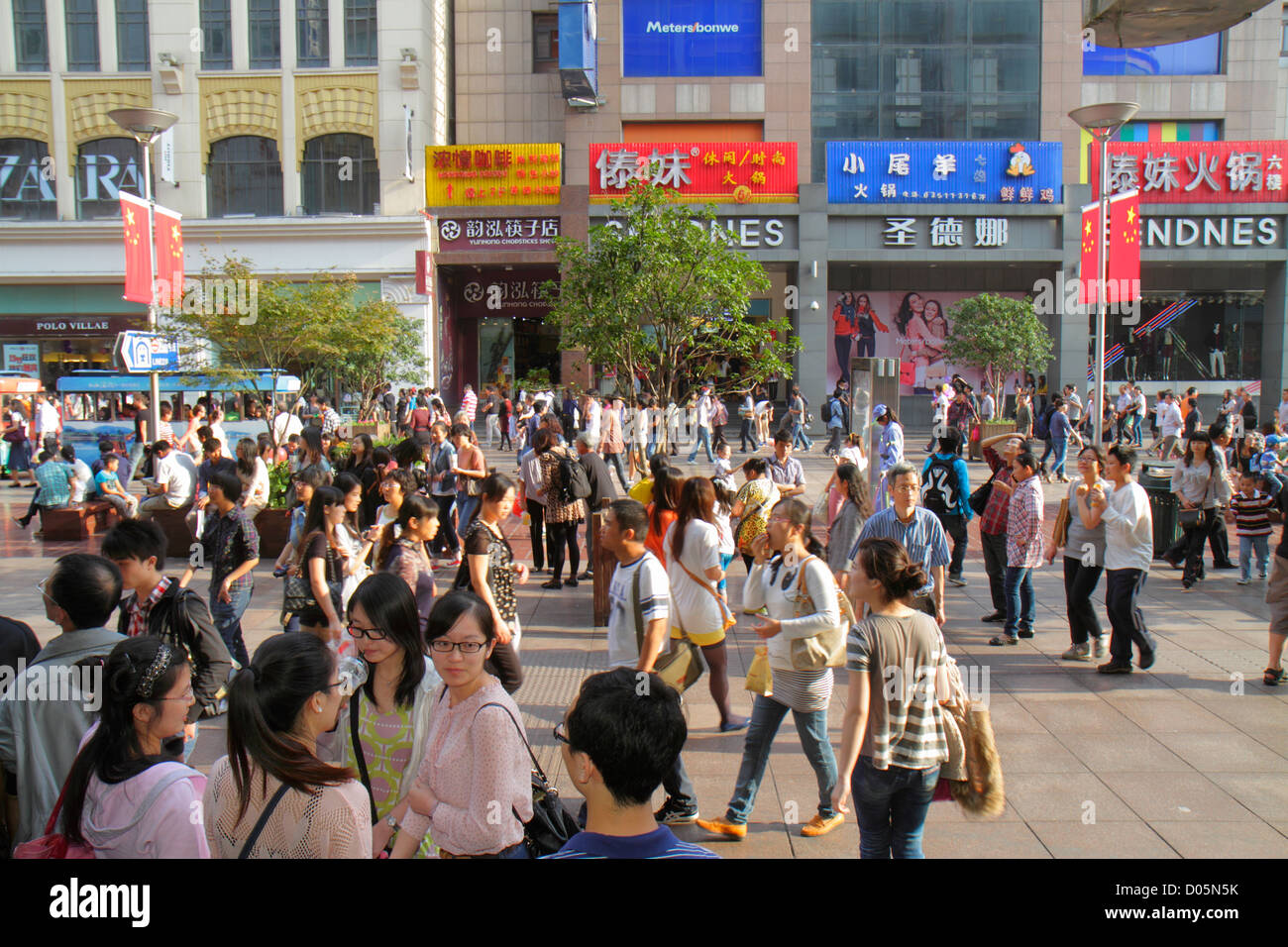 Shanghai China,Huangpu District,East Nanjing Road,pedestrian mall,Asians man men male,woman female women,teen teens teenager teenagers girl girls,kids Stock Photo