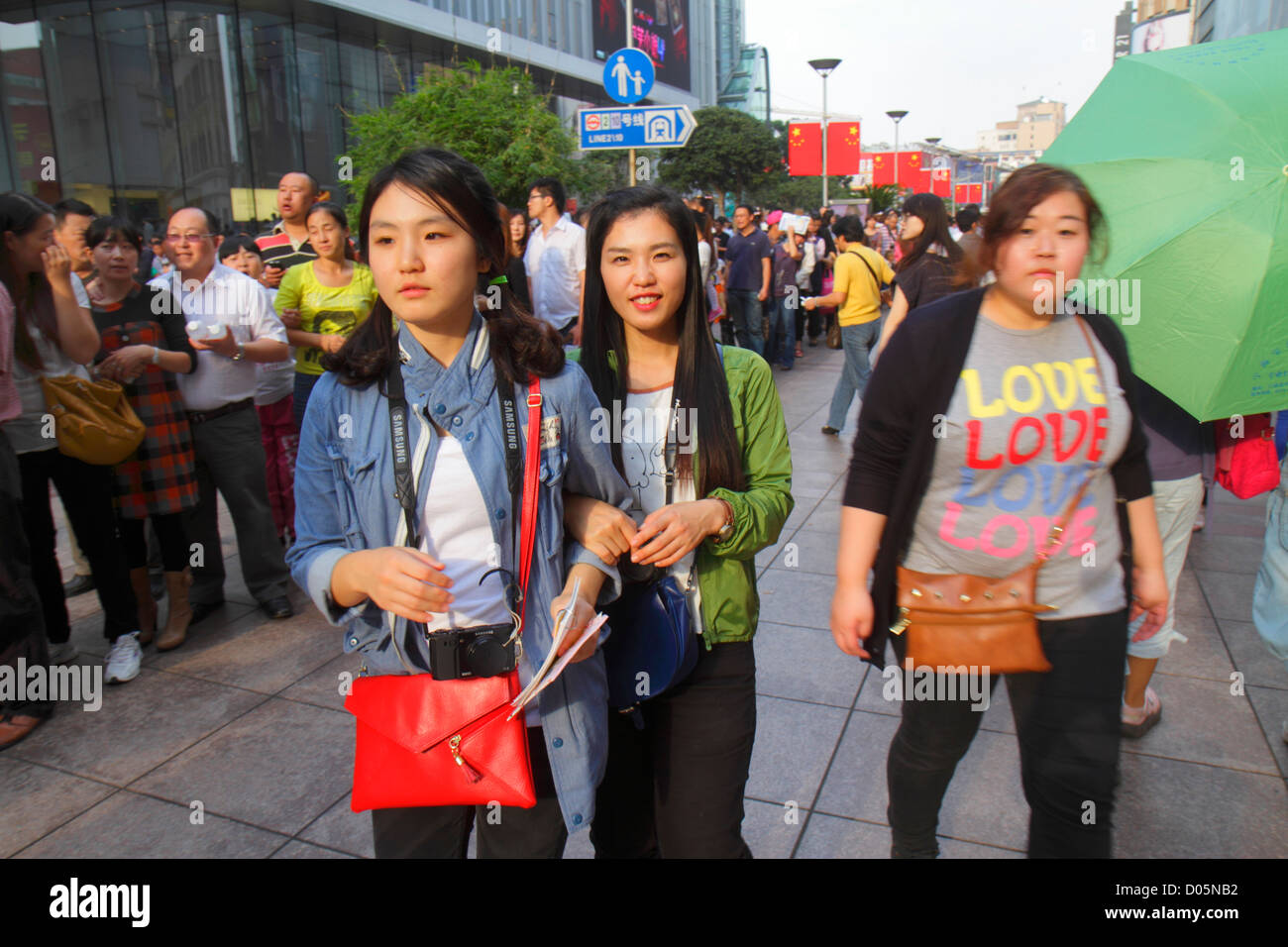 Shanghai China,Asia,Chinese,Oriental,Huangpu District,East Nanjing Road,pedestrian mall arcade,Asian Asians,teen teens teenage teenager teenagers yout Stock Photo