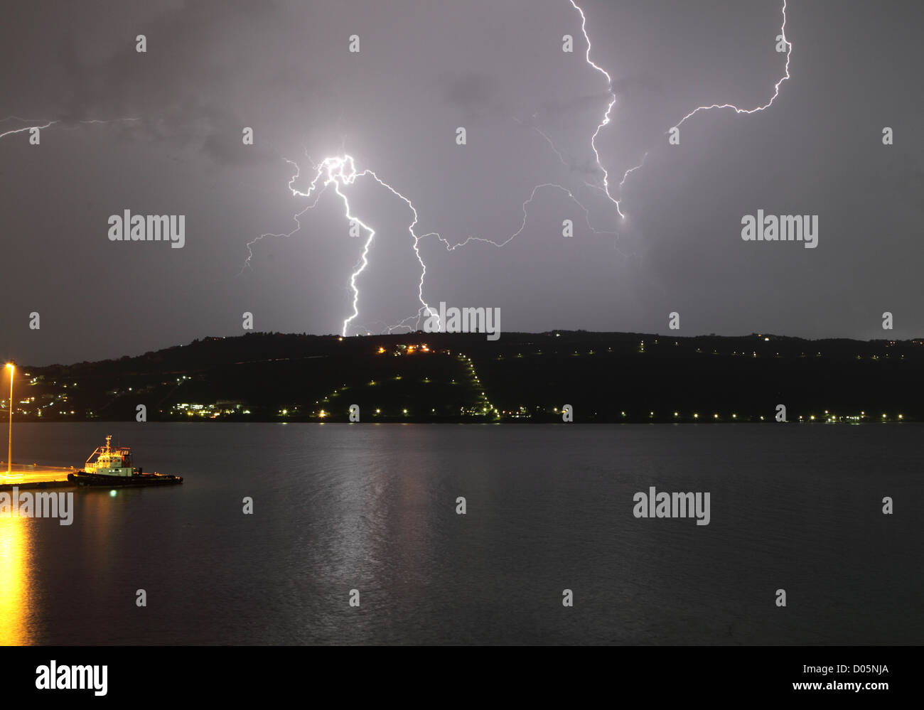 Flashes of lightning light up the sky over Akrotiri, during a ferocious early winter thunderstorm over Souda Bay, Crete, Greece Stock Photo