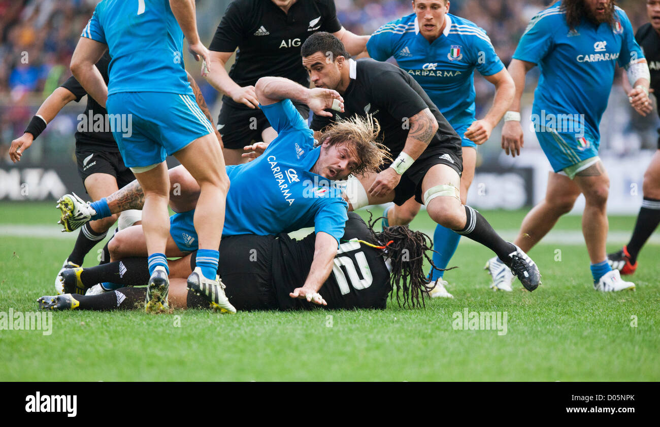 Saturday, Nov. 17th 2012. Olympic stadium, Rome. Italy. International Rugby test match Italy v. New Zealand. - Italian prop Andrea Lo Cicero lands on top of All Black Ma'a Nonu after a tackle during the match. Stock Photo