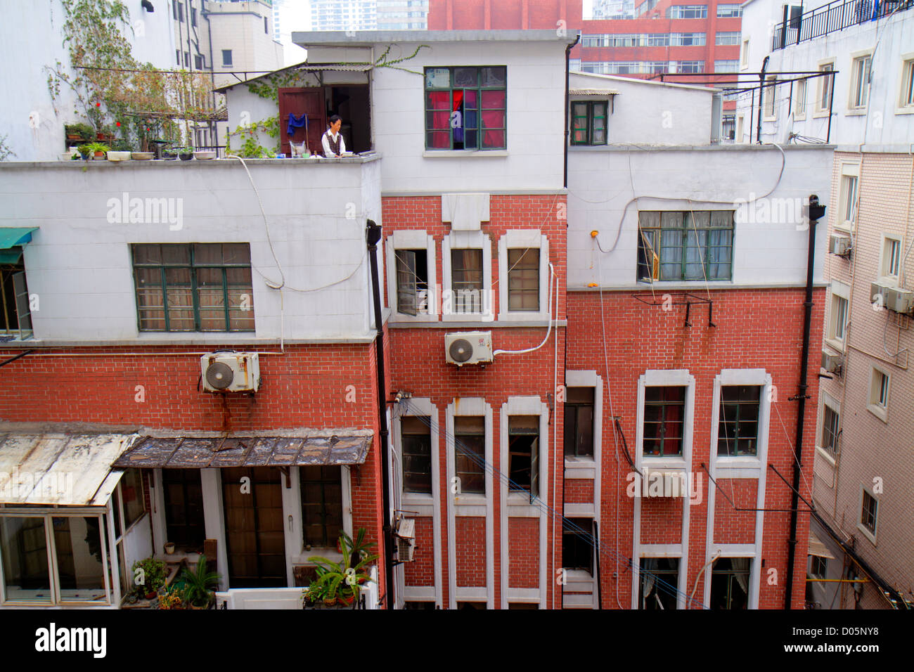 Shanghai China,Chinese Huangpu District,Shashi Road,residential condominium,residential,apartment,apartments,flat,building,Asian woman female women,ur Stock Photo