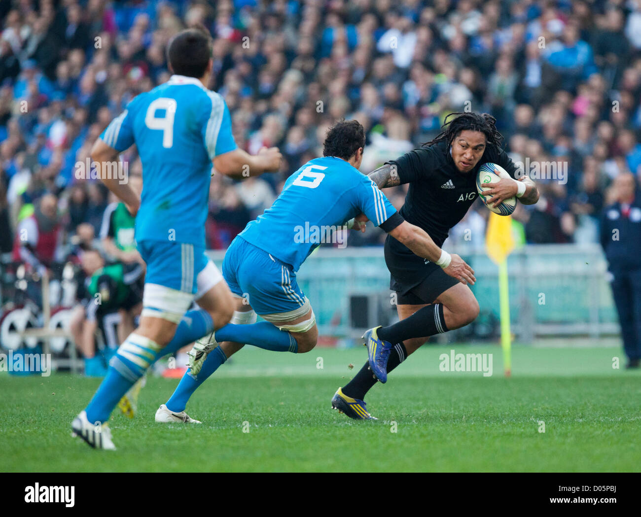 Saturday, Nov. 17th 2012. Olympic stadium, Rome. Italy. International Rugby test match Italy v. New Zealand. New Zealand's Ma'a Nonu fends of Italian no 5 Francesco Minto Stock Photo