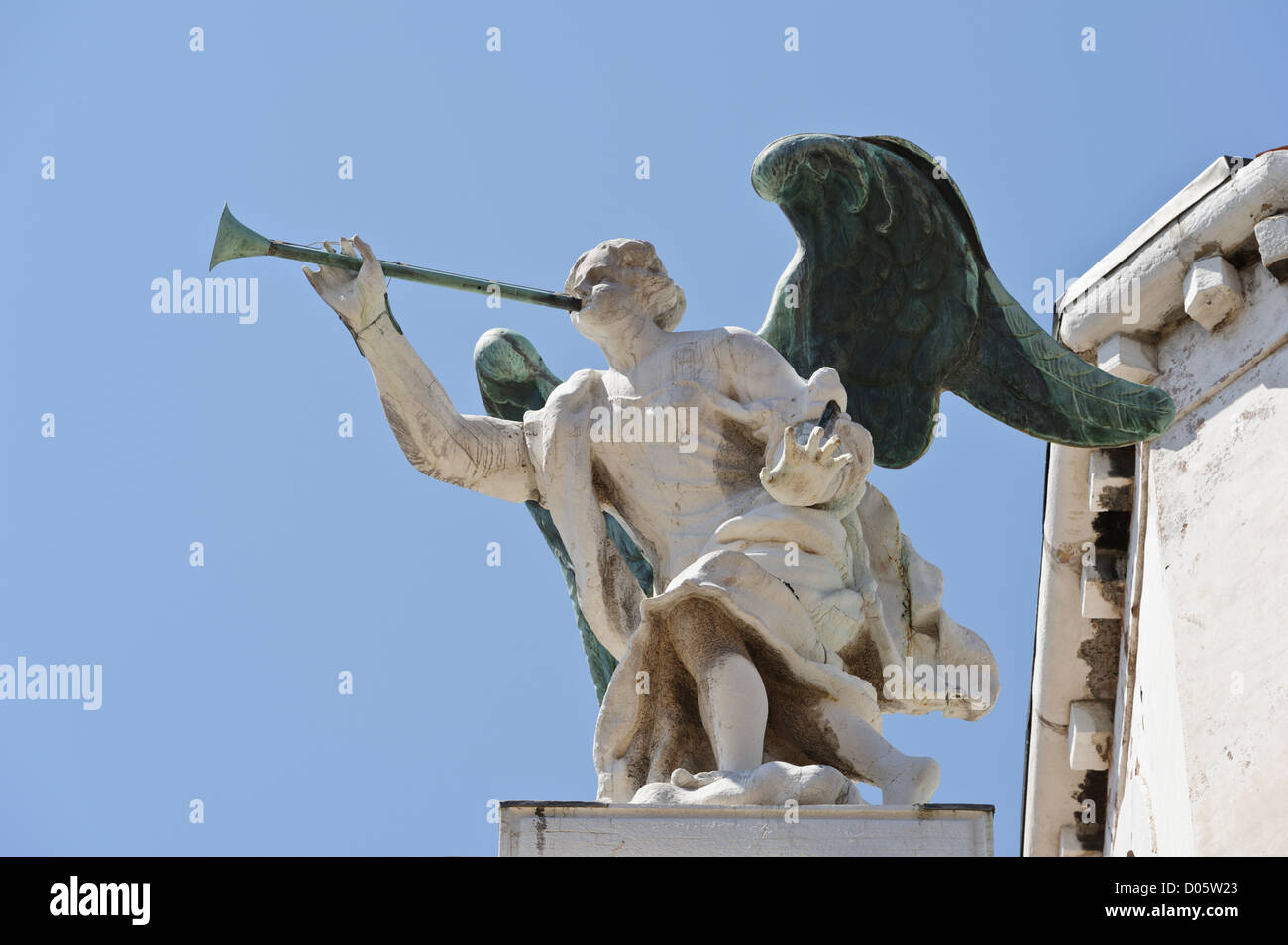 Angel blowing trumpet, Venice, Italy Stock Photo Alamy