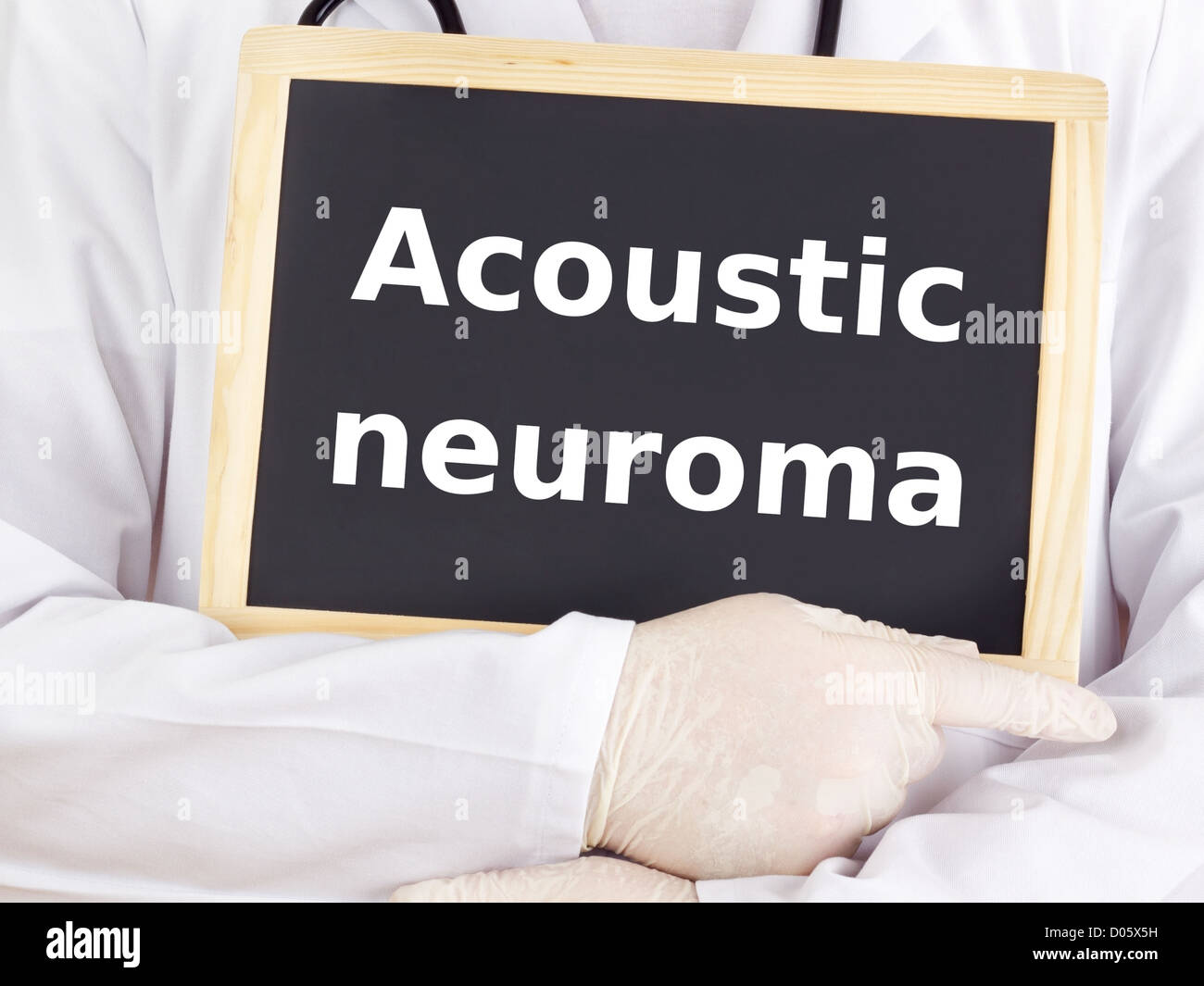 Doctor shows information on blackboard acoustic neuroma Stock Photo