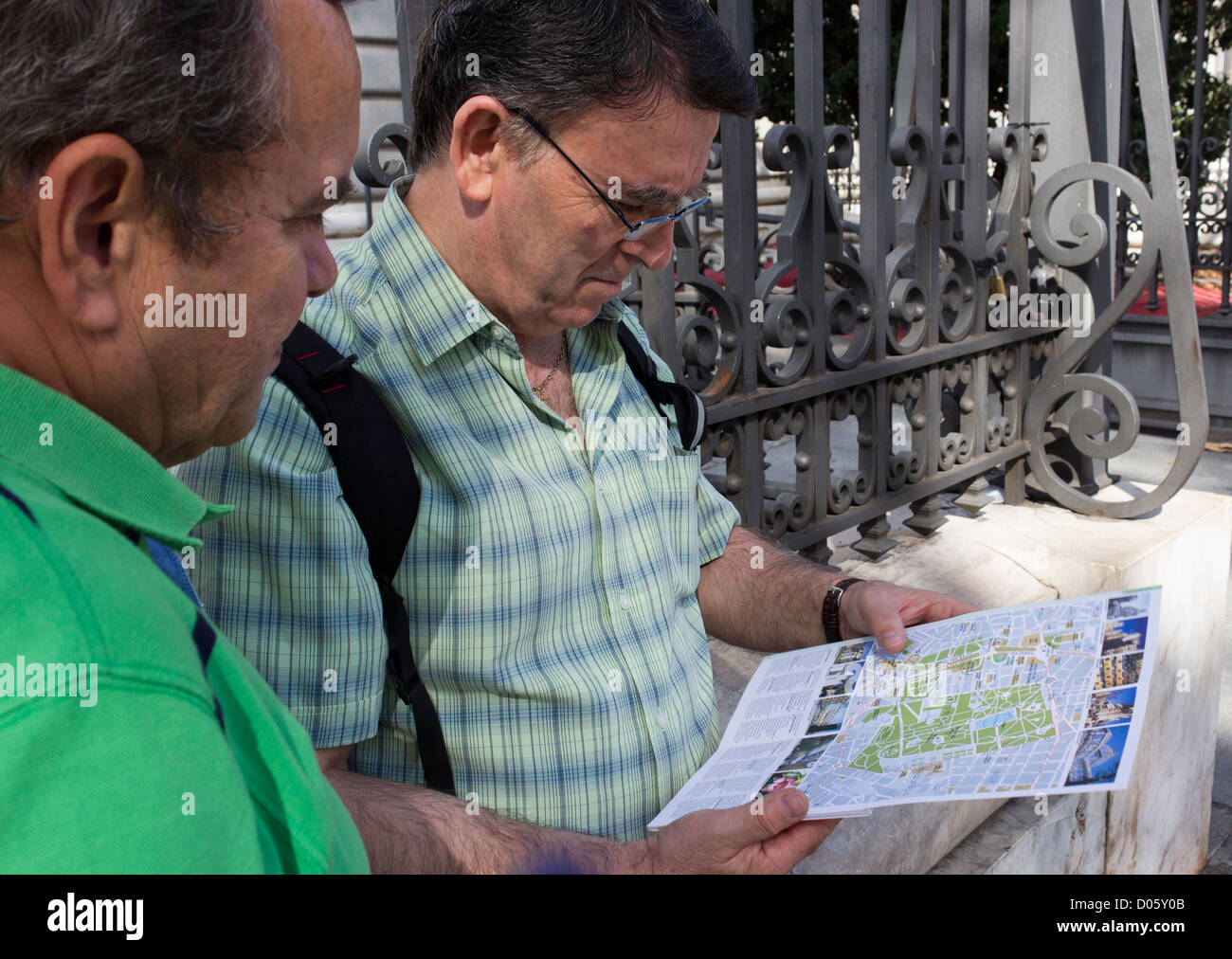 Madrid, Spain. Tourists following directions on map. Stock Photo