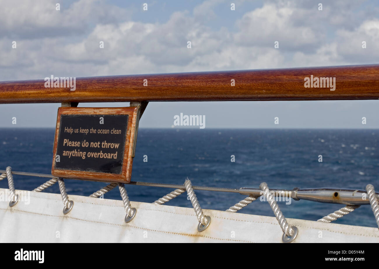 Notice at the stern of the Cunard cruise ship Queen Mary 2 advising not to pollute the sea by throwing anything overboard. Stock Photo