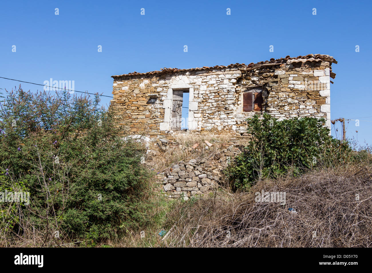 Old abandoned stone house ruins in Greece after an earthquake Stock ...