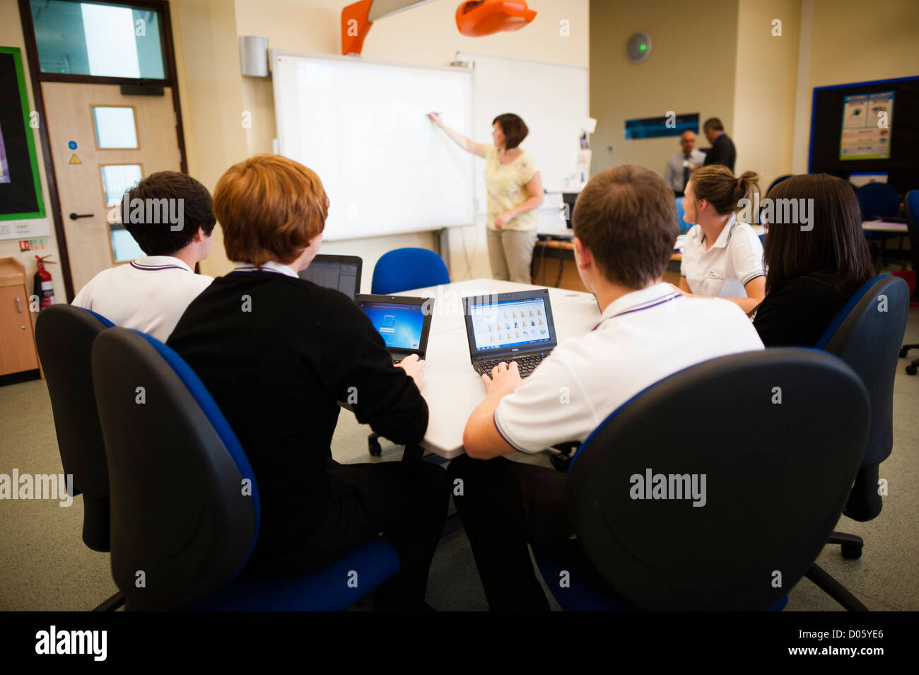 A level pupils using IT ICT information technology tablet computers in