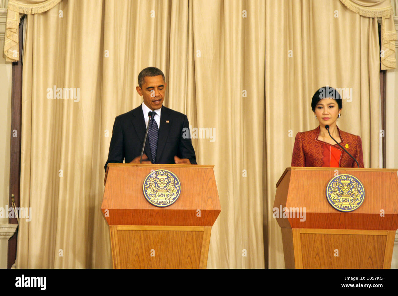 Bangkok, Thailand. 18th November , 2012 . During a joint press conference following their bilateral meeting at the Thai Government House. Obama landed in Thailand , intensifying his diplomatic 'pivot' to Asia, on a tour which will see him make history by visiting Myanmar in a bid to encourage political reform.  After arriving at Bangkok's Don Mueang airport just after 3pm, Mr Obama met a group of Thai officials, including His Majesty the King's representative Gen Surayud Chulanond. The re-elected president and his entourage then met 600 members of the US embassy staff and later visited Wat Pho Stock Photo