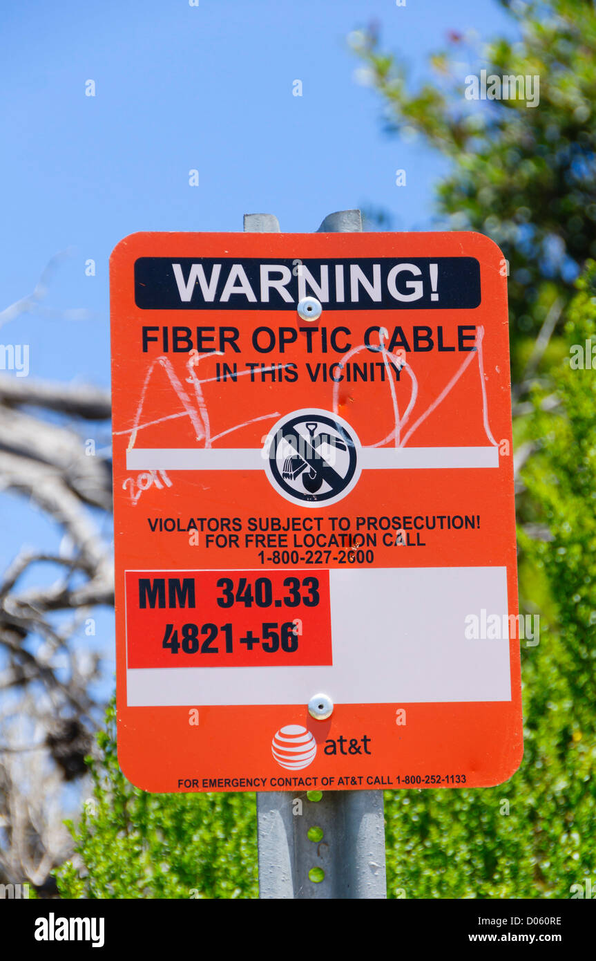 Highway 1 California Pacific Coast drive - Arroyo Hondo Creek bridge, north of Santa Barbara. Fiber optic cable digging warning. Stock Photo
