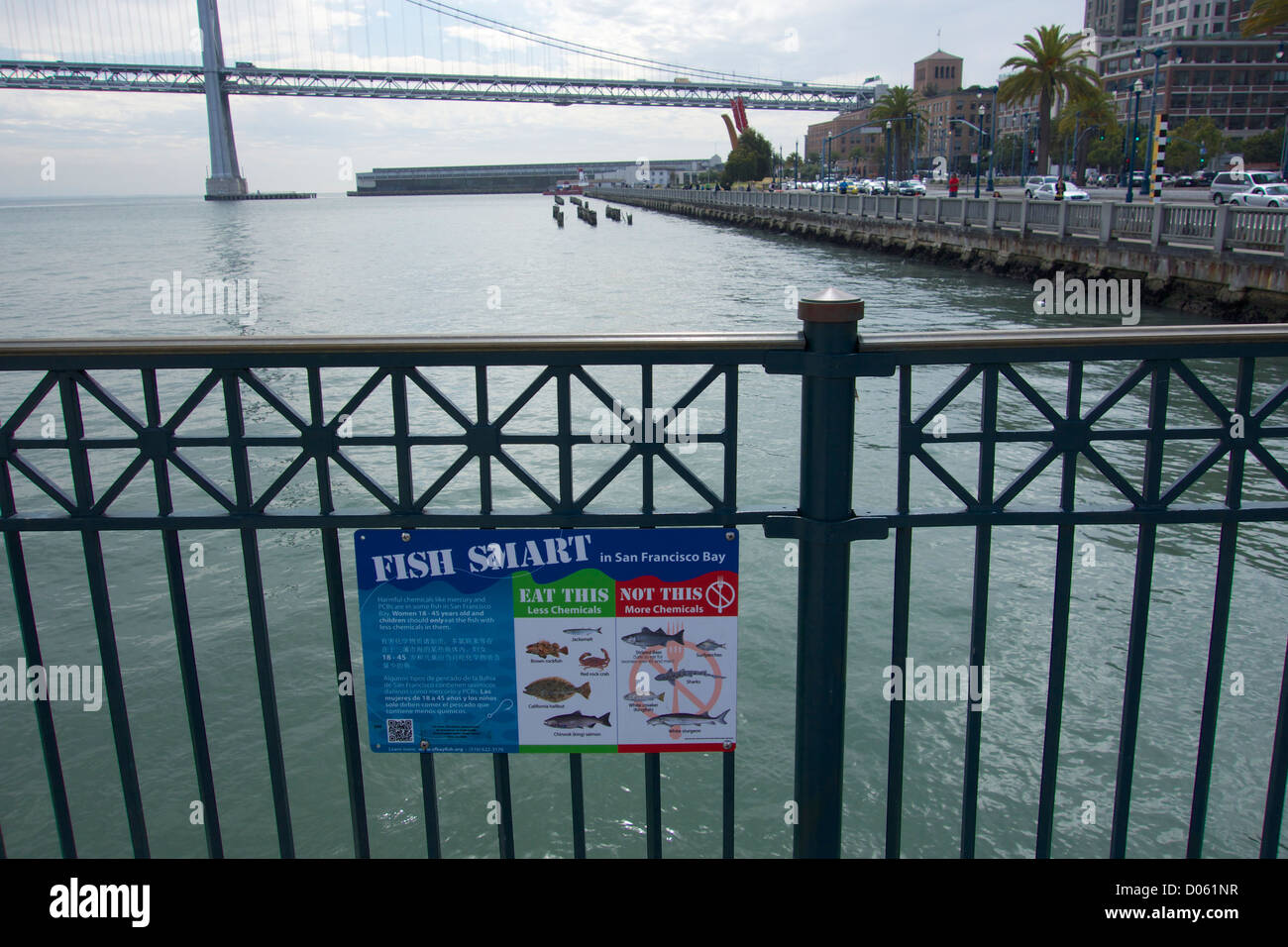 Sign warning of chemical contamination in some fish. Pier 14 San Francisco Californis Stock Photo