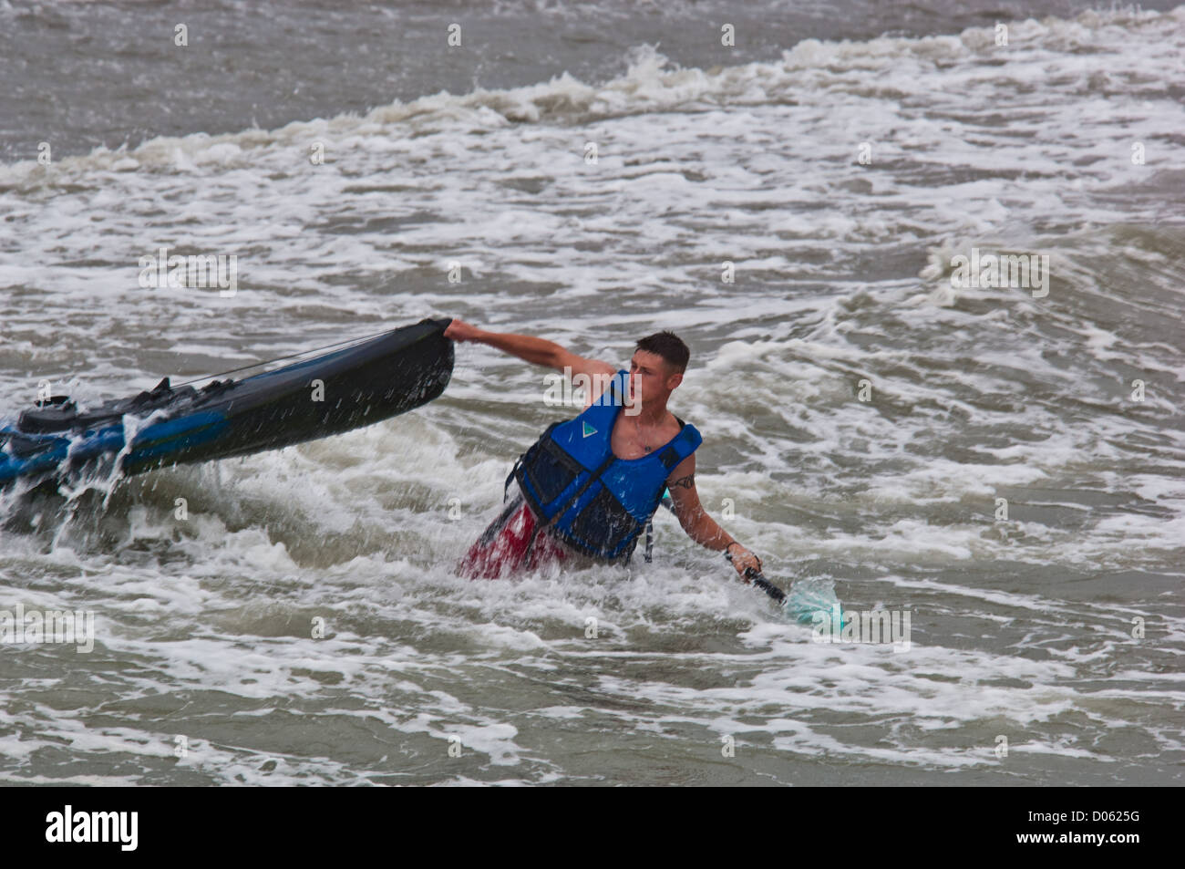 Kayaker battling the waves during Hurricane Emily, Port Aransas Texas Stock Photo