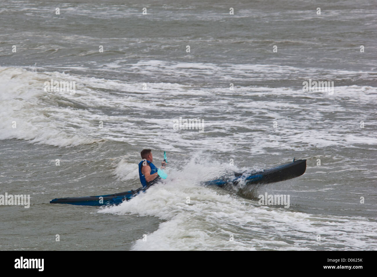 Kayaker battling the waves during Hurricane Emily, Port Aransas Texas Stock Photo