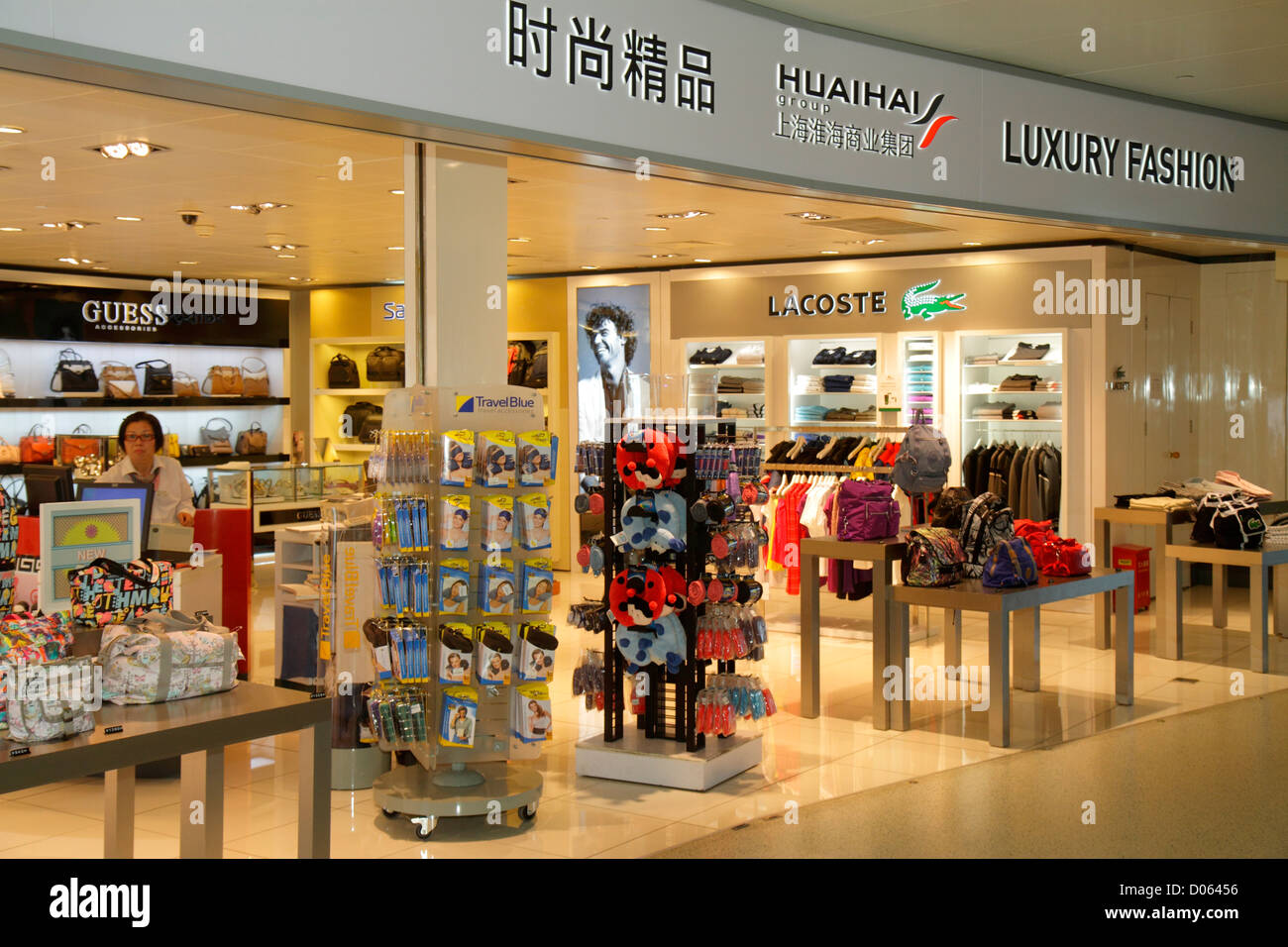 Shanghai China,Chinese Changning District,Hongqiao Airport,Terminal 2,SHA,gate,Mandarin,hanzi,characters,symbols,English language,bilingual,shopping s Stock Photo