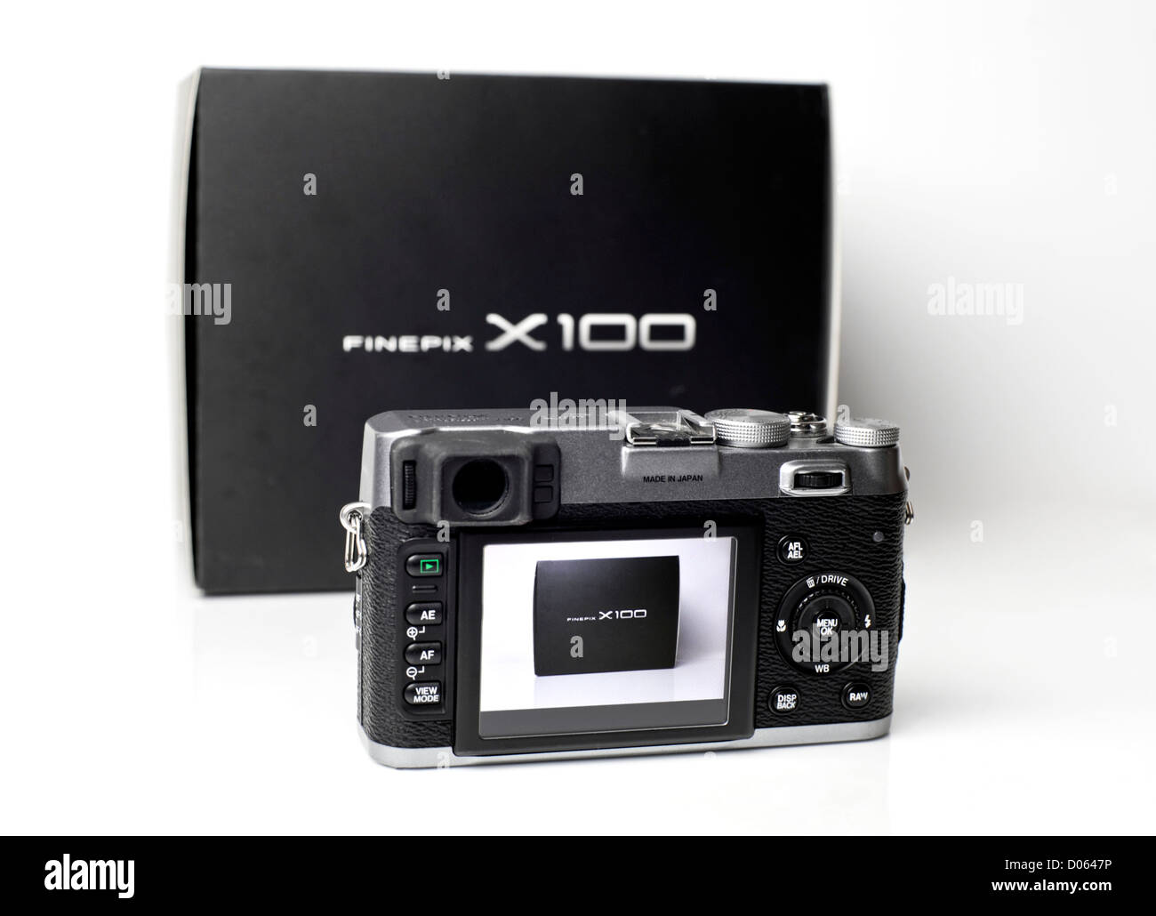 Fugi Fine Pix X100 DSLR camera front view with after market lens hood Stock Photo
