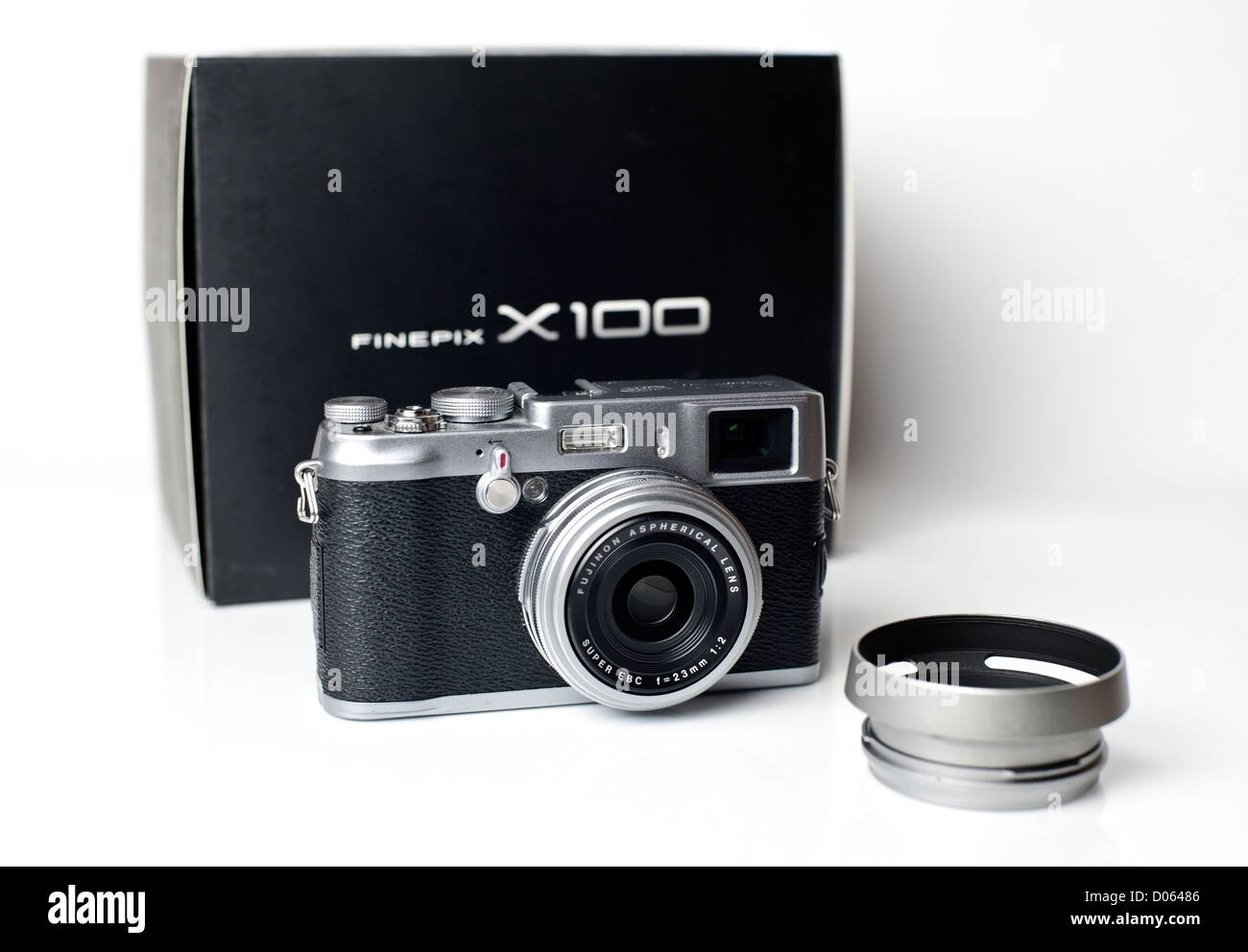 Fugi Fine Pix X100 camera front view with after market lens hood Stock Photo