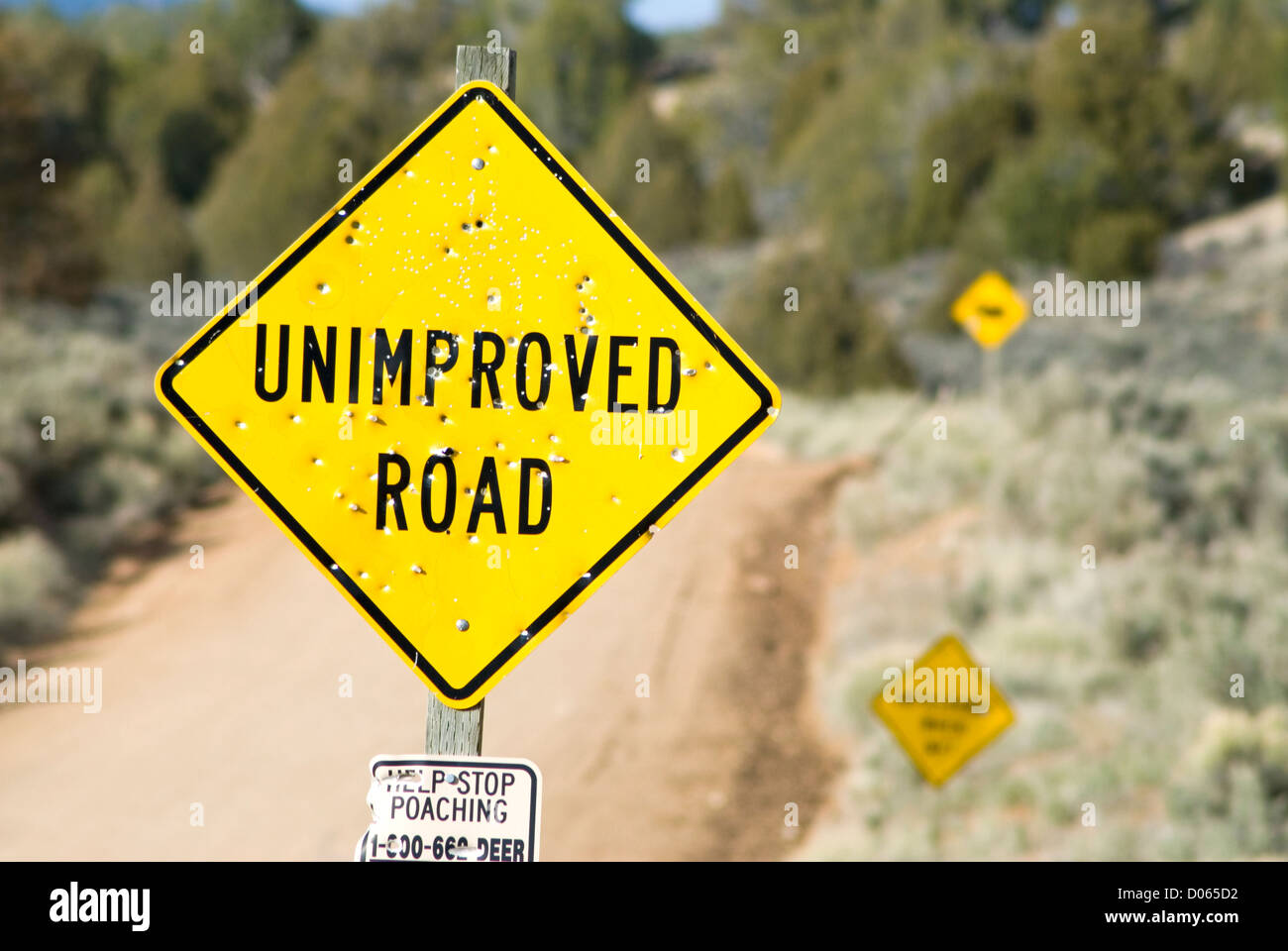 Bullet Holes In Road Sign Stock Photos & Bullet Holes In Road Sign