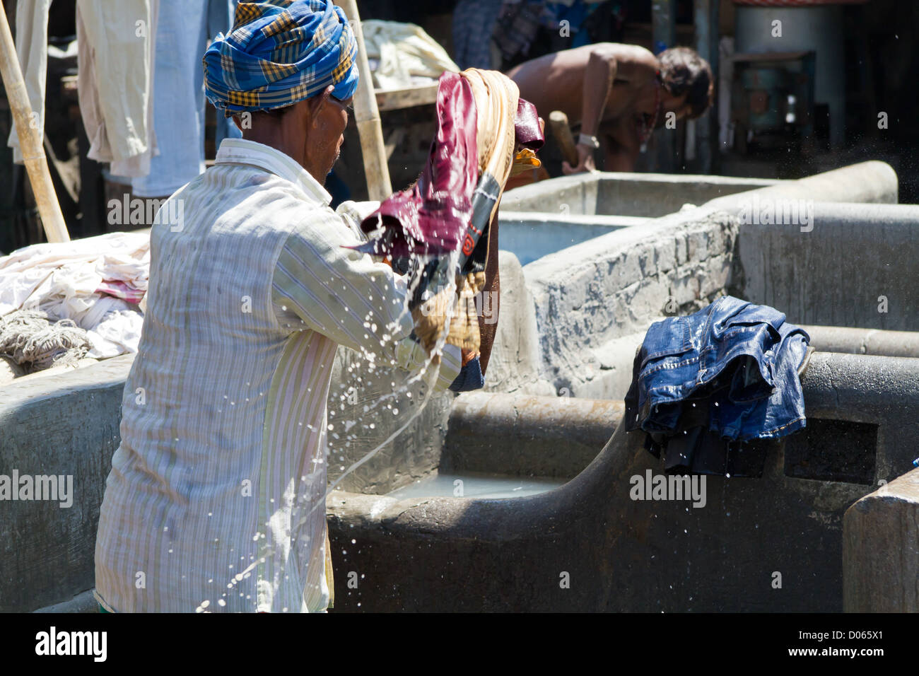 Launderer at Work in the open air Laundry of Dhobi Ghat in Mumbai ...