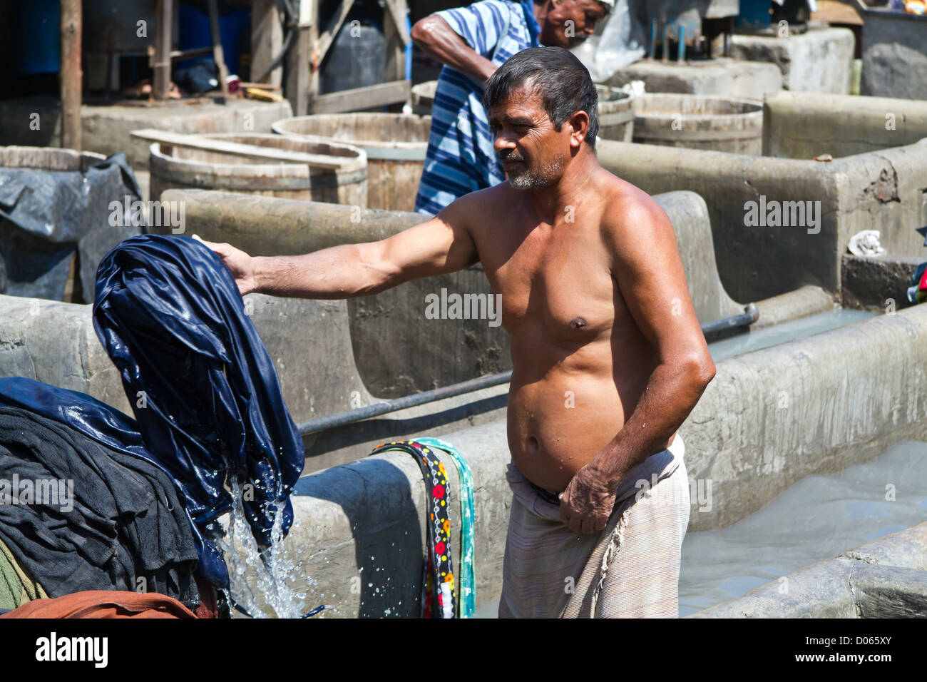 Launderer at Work in the open air Laundry of Dhobi Ghat in Mumbai ...