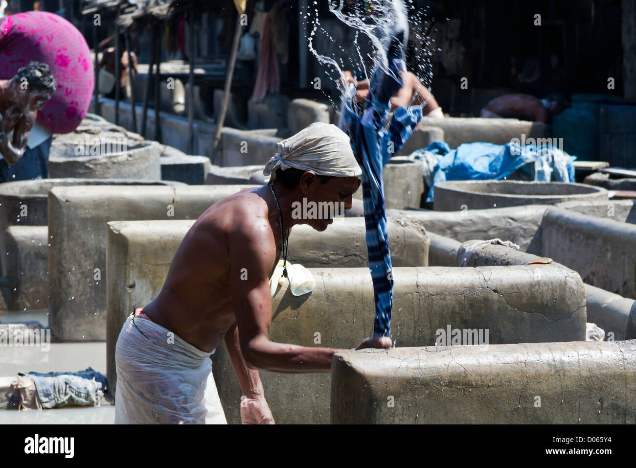 Launderer at Work in the open air Laundry of Dhobi Ghat in Mumbai ...