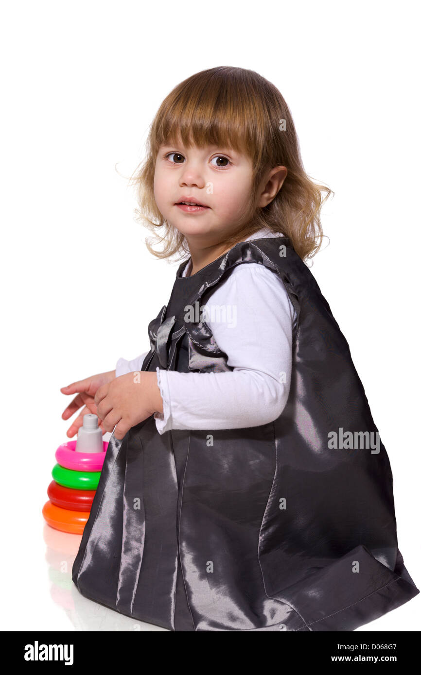 Happy Little Girl playing isolated on white Stock Photo - Alamy