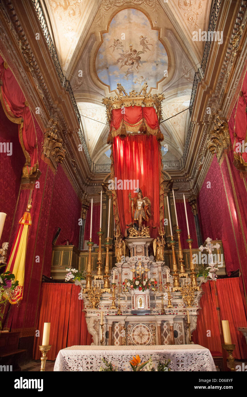 INTERIOR OF THE SAINTMICHEL ARCHANGE BASILICA WITH ITS RED WALL HANGINGS MENTON ALPESMARITIMES