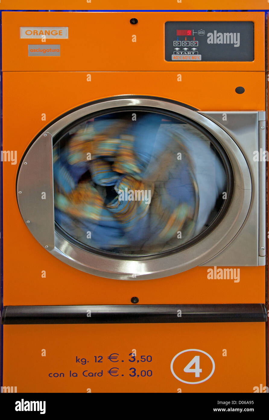 large coinoperated dryer in a laundromat Stock Photo Alamy