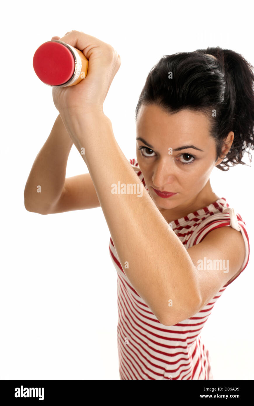 Young woman with big pencil eraser rubber isolated on white background