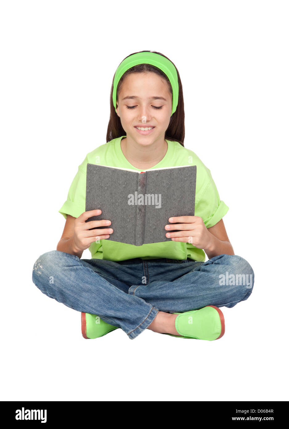Adorable little girl reading a book isolated on white background Stock ...