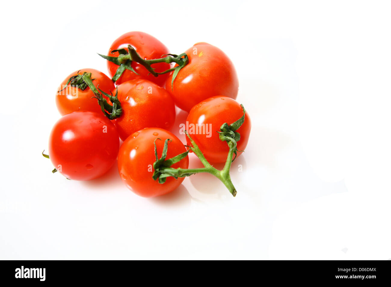 Cherry tomatoes isolated on white background Stock Photo - Alamy