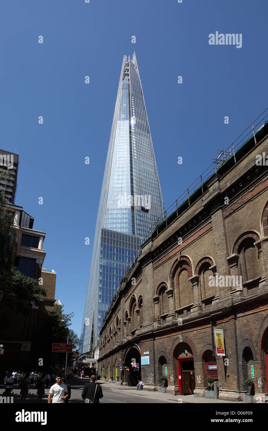 The Shard of Glass, London, structurally complete, designed by Renzo Piano showing London Bridge Station in the foreground Stock Photo