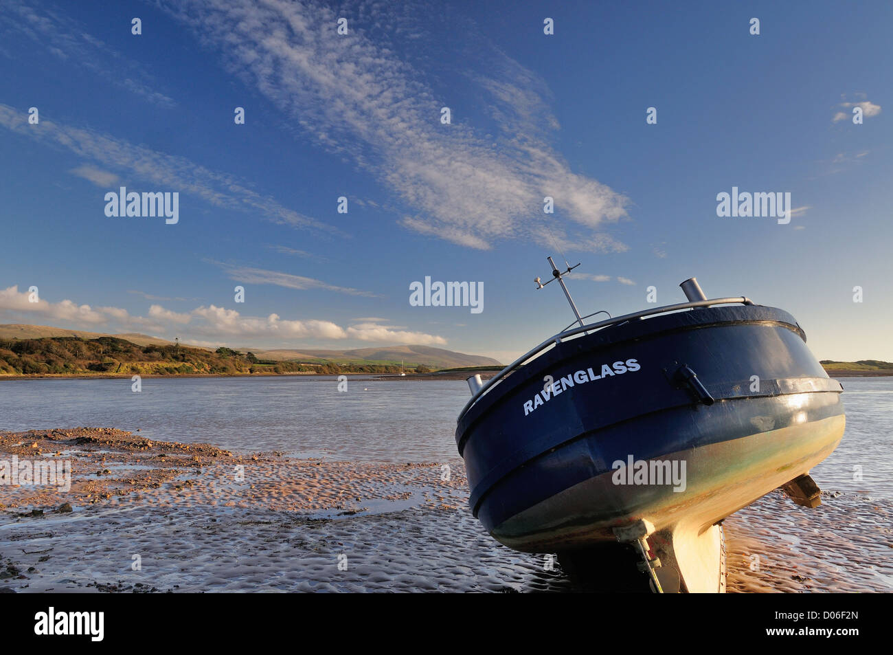 Boat on the beach at Ravenglass on the west coast of the English Lake District Stock Photo