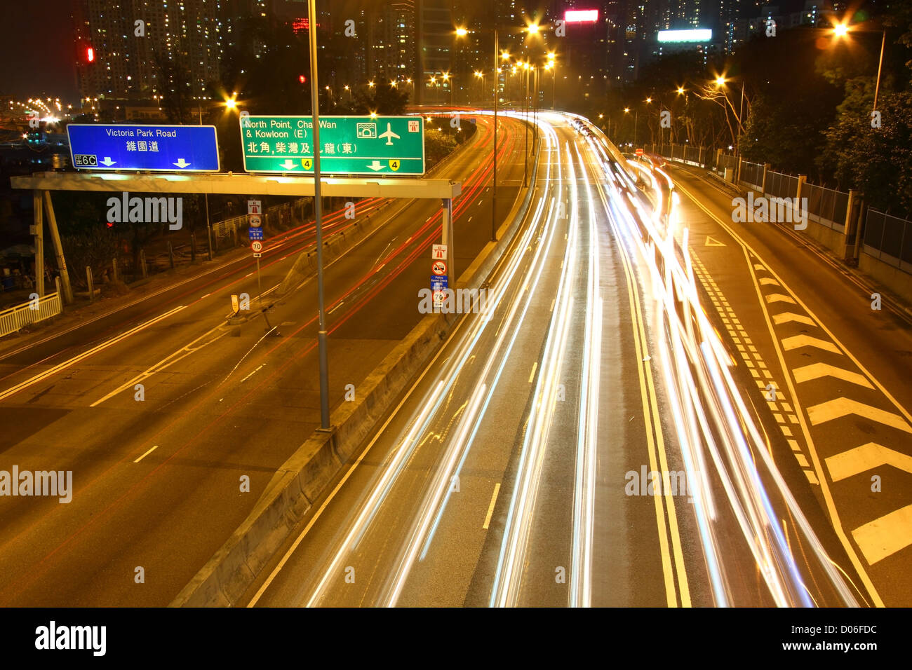 Traffic through downtown of Hong Kong at night Stock Photo - Alamy