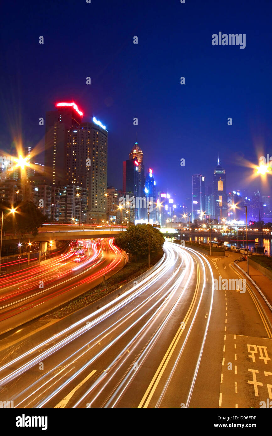 Traffic through downtown of Hong Kong at night Stock Photo - Alamy