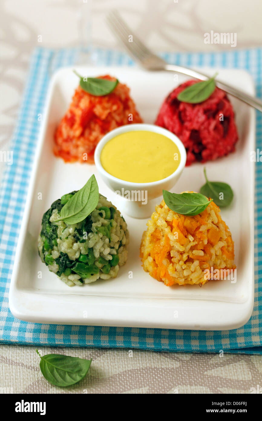 Rice in four colours. Recipe available Stock Photo - Alamy