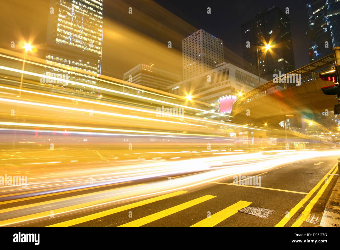 Traffic through downtown of Hong Kong at night Stock Photo - Alamy