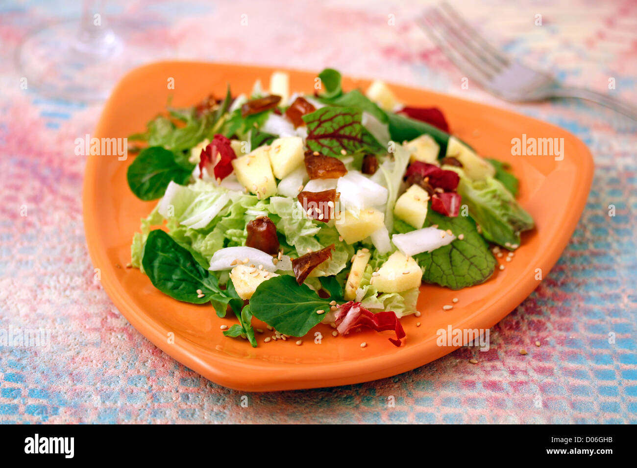 Salad with apple and dates. Recipe available Stock Photo Alamy