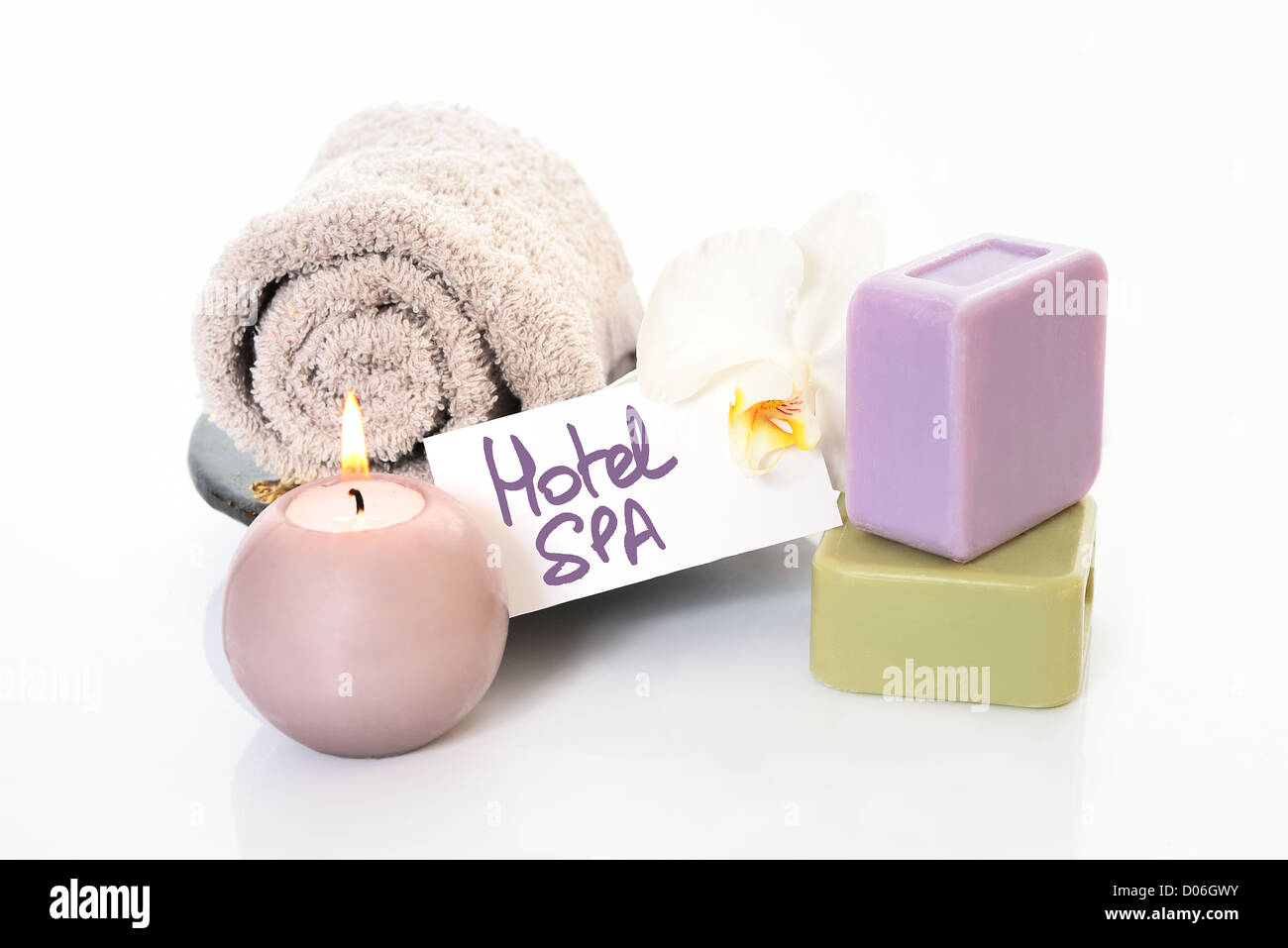Spa and wellness setting with natural soap, candles and towel Beige ...
