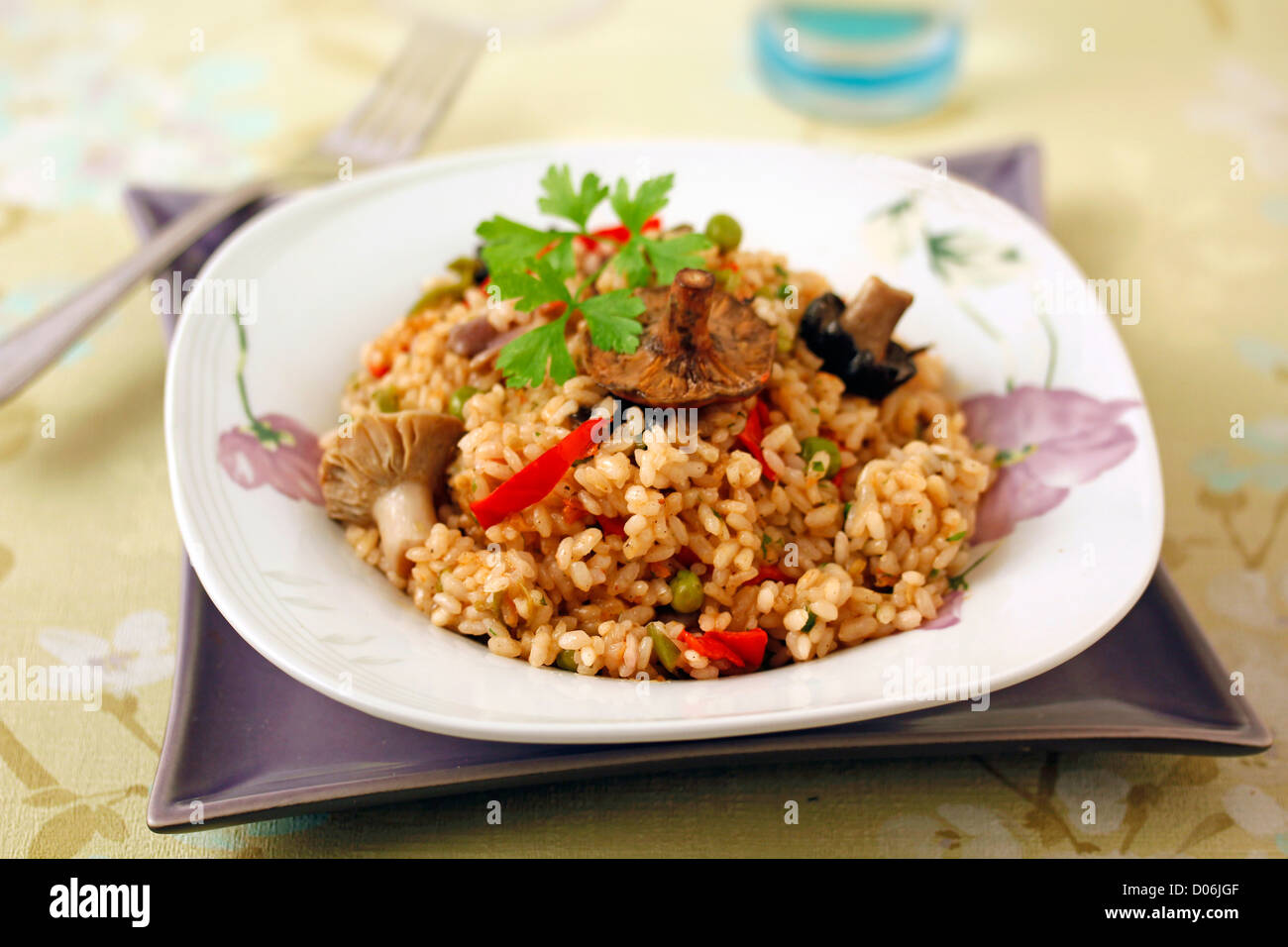 Paella with wild mushrooms. Recipe available. Stock Photo